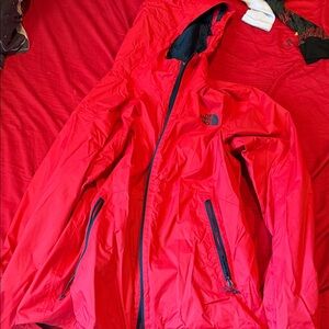 The North Face Red Hooded Shell Jacket with Black Zippers